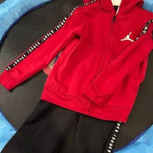 Jordan Red Jacket with Black Pants